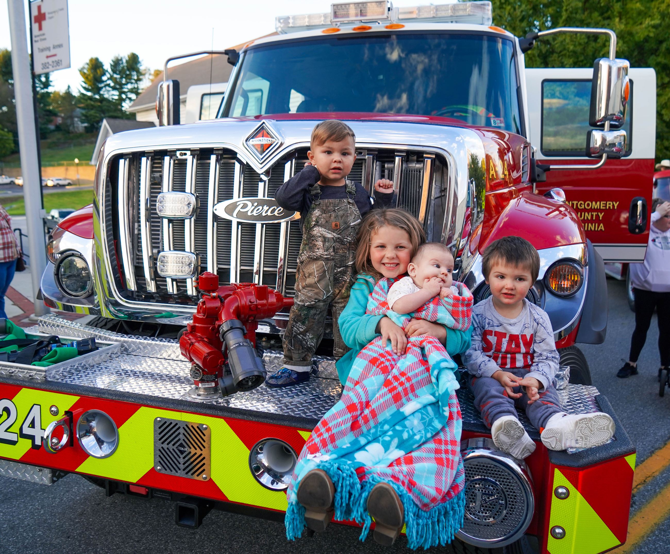 Fire Prevention Parade image featuring children and a fire truck
