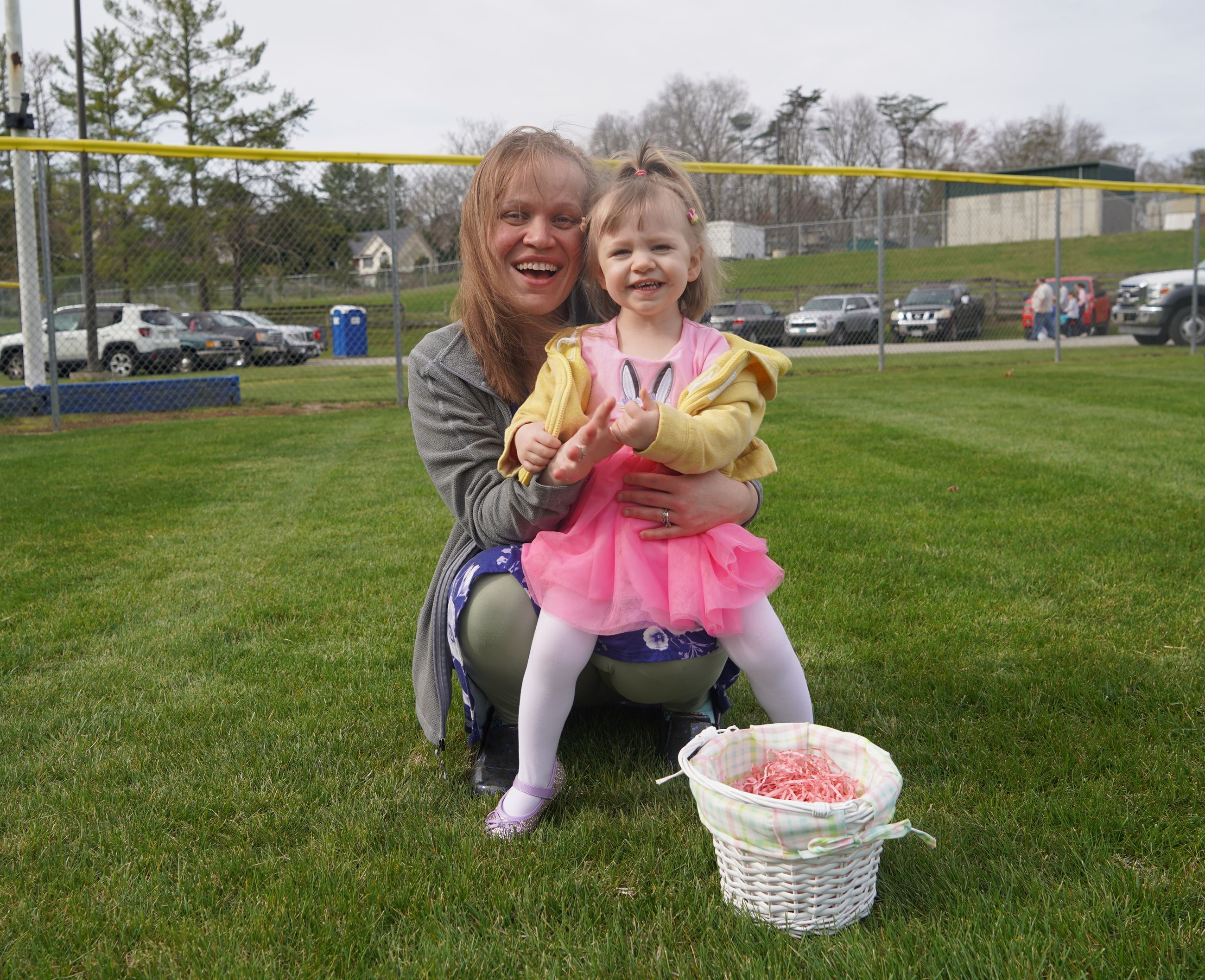 Mother and child hunting eggs at Great Easter Egg Hunt