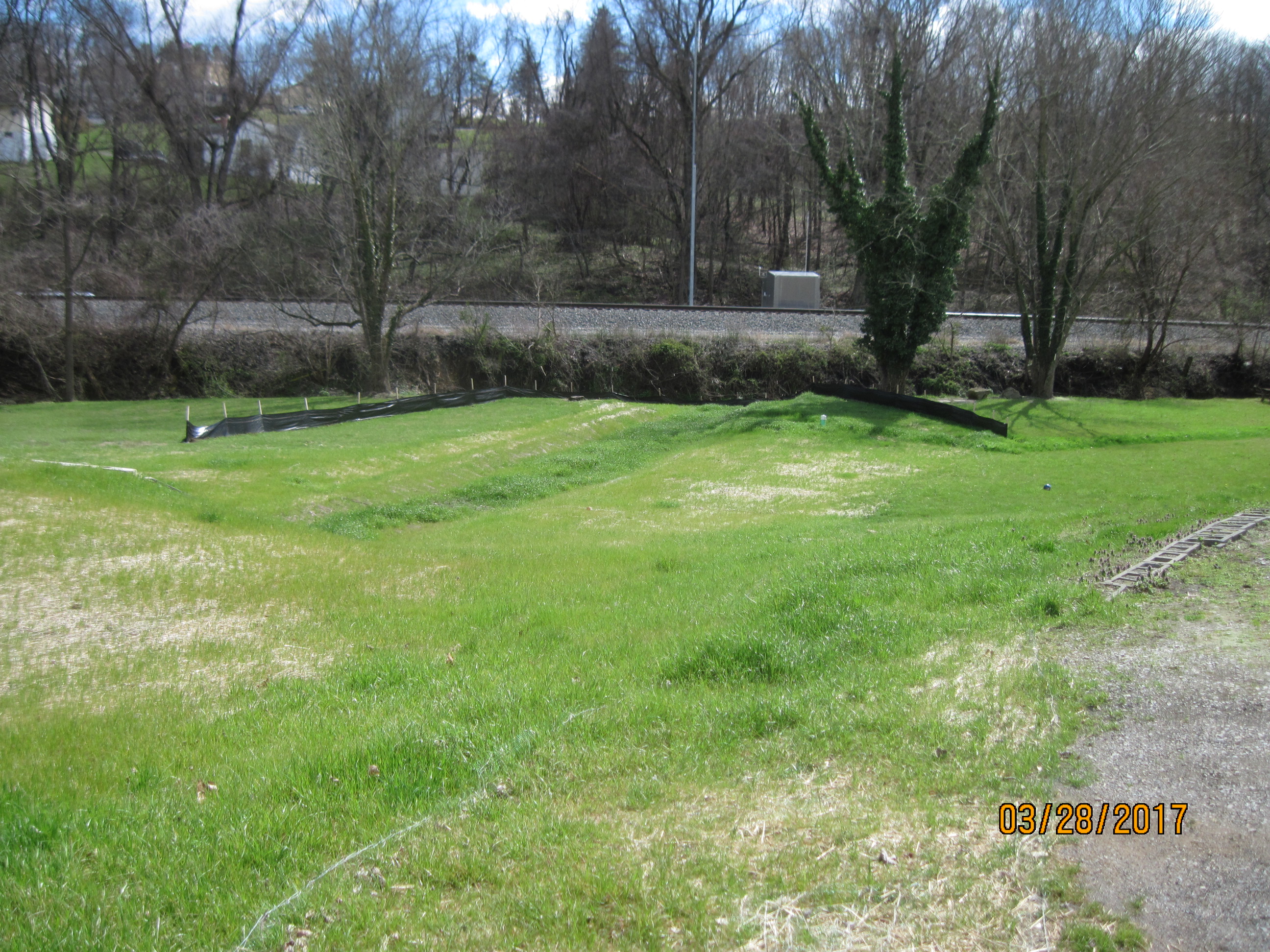 The construction area has been matted and seeded