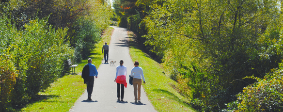 Pedestrians on the Huckleberry Trail.